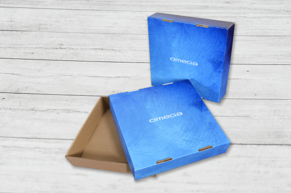 Bolsas y cajas premium en cartón microcorrugado con vinilo impreso y troquelado.